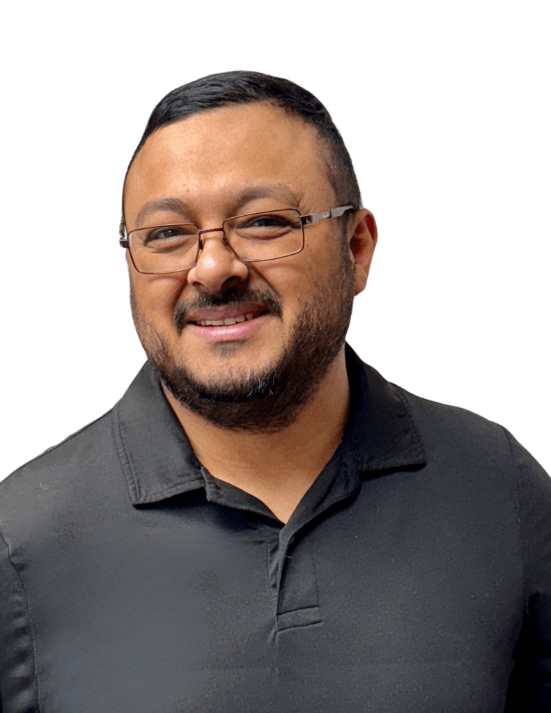 Headshot of REALTOR® Mario Ramos, a bilingual real estate professional based in Hawarden, Iowa, serving Northwest Iowa.